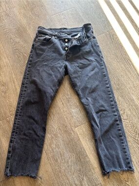Levi's button fly 501  Black Washed Straight Jeans with Raw Hem